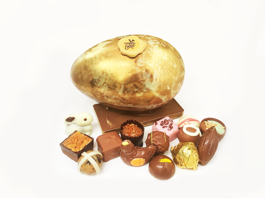 Easter Egg Filled with Truffles and Easter Pralines
